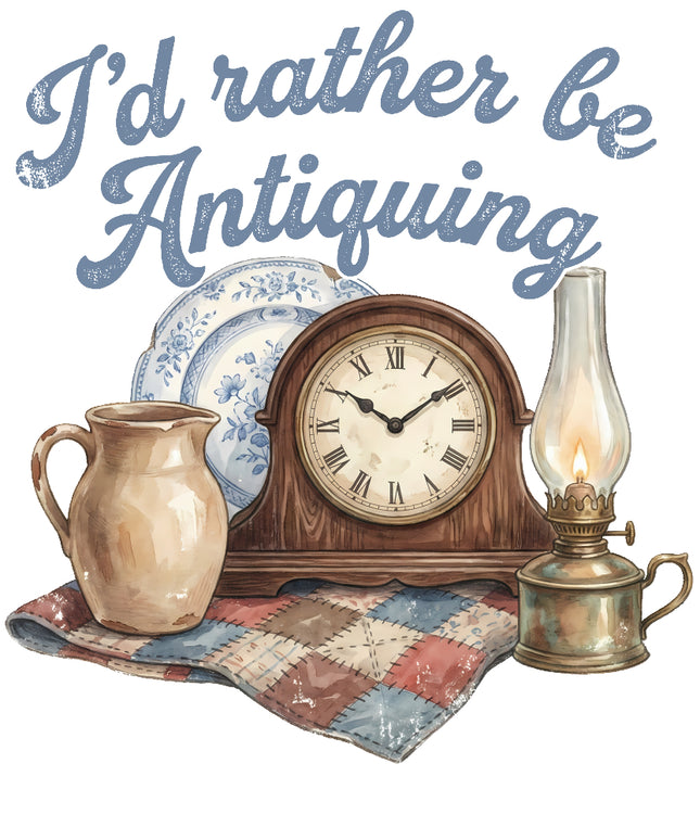 Decorative scene with clock, pitcher, plates, and oil lamp on a quilt with 'I'd rather be Antiquing' fabric panel