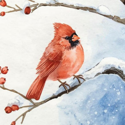 Red cardinal bird perched on a snow-covered branch quilt block