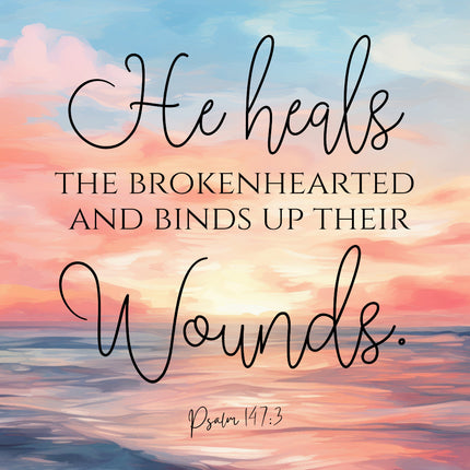 A fabric panel with the text 'He heals THE BROKENHEARTED AND BINDS UP THEIR WOUNDS. Psalm 147:3' set against a colorful sky background.