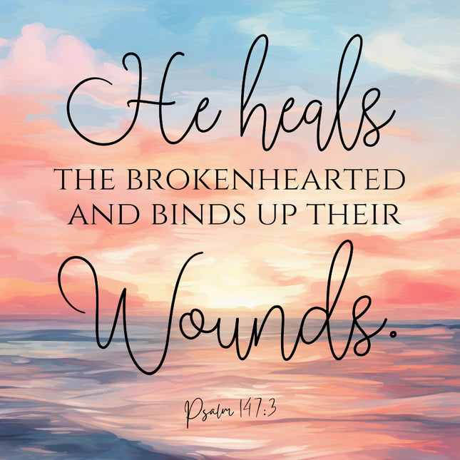 A fabric panel with the text 'He heals THE BROKENHEARTED AND BINDS UP THEIR WOUNDS. Psalm 147:3' set against a colorful sky background.