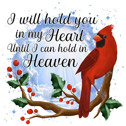 A fabric panel featuring a red cardinal bird perched on a branch with holly and berries, with text 'I will hold you in my Heart Until I can hold in Heaven'.