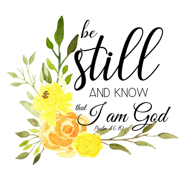 A fabric panel featuring a floral design with the text 'be still AND KNOW that I am God Psalm 46:10' printed on it.