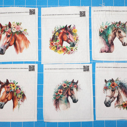 Six fabric panels with horse illustrations wearing floral wreaths on a blue tiled background.
