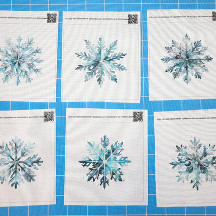 Six snowflake quilt blocks