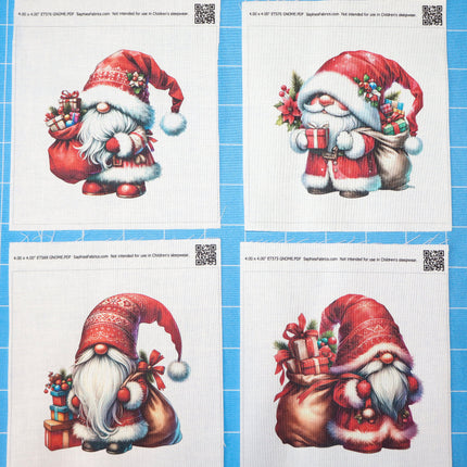 Four Christmas-themed gnomes with Santa hats quilt blocks