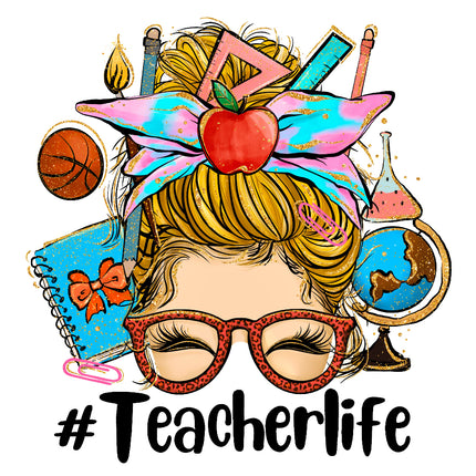 A fabric panel with a design that includes a stylized face with glasses and a apple on top, surrounded by educational themed items like a globe, notebook, and paint brushes, with the hashtag #Teacherlife.