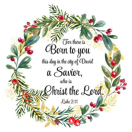 A fabric panel with a Christmas-themed design including green foliage, red berries, and the text 'For there is Born to you this day in the city of David a Savior, who is Christ the Lord. Luke 2:11'.