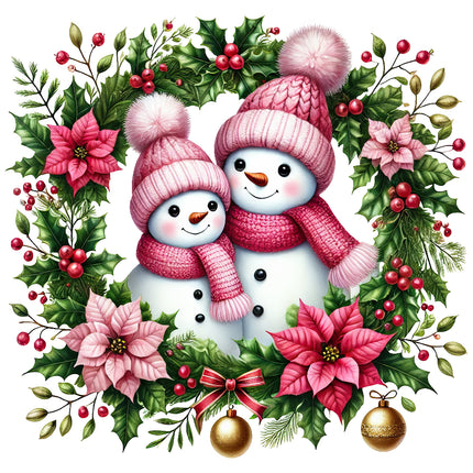 A fabric panel featuring two smiling snowmen with pink hats and scarves, set within a festive wreath of green leaves, red berries, and pink flowers.