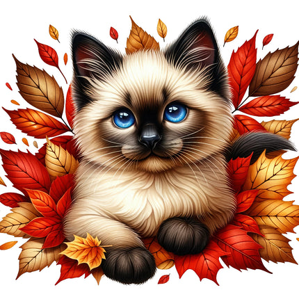 A fabric panel block featuring an image of a kitten with blue eyes surrounded by autumn leaves.
