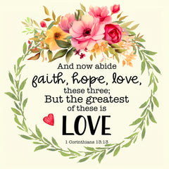A fabric panel with a floral design and a Bible verse 'And now abide faith, hope, love, these three; But the greatest of these is LOVE 1 Corinthians 13:13' printed in the center.