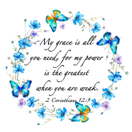 A fabric panel with a floral and butterfly design and a Bible verse from 2 Corinthians 12:9.
